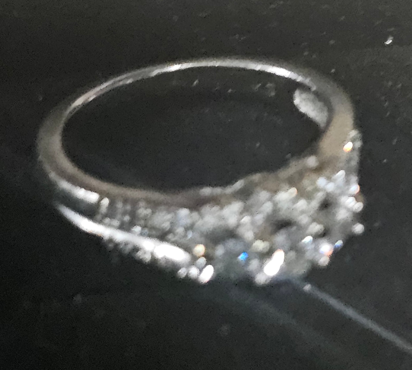 Three stone 10kt white gold diamond ring